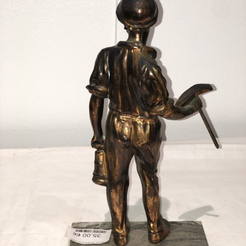 Mineur. Sculpture en métal